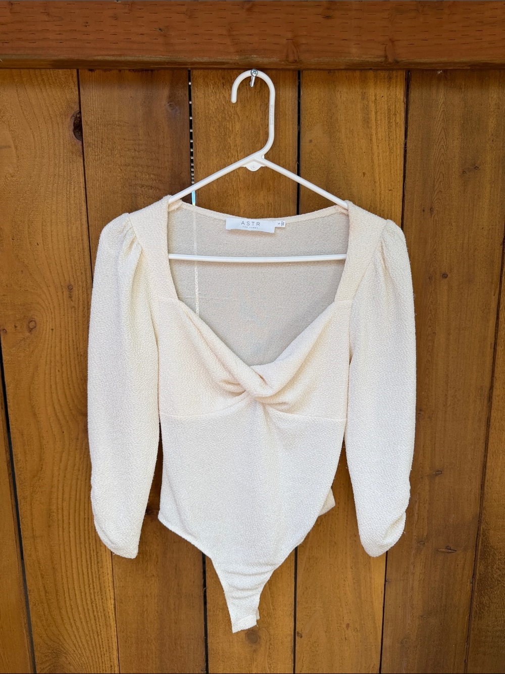 Astr Cream Twist Front Long Sleeve Bodysuit